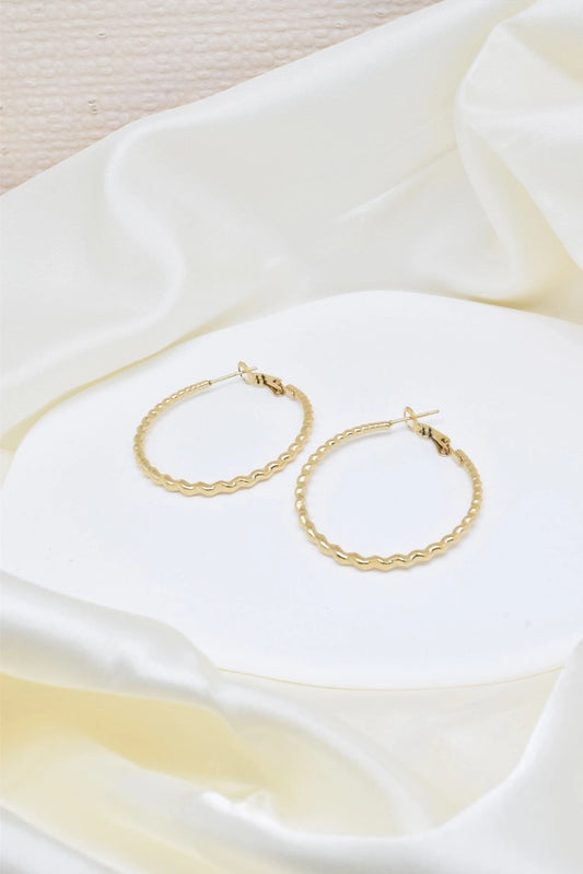 Gedraaide hoops small goudkleurig
