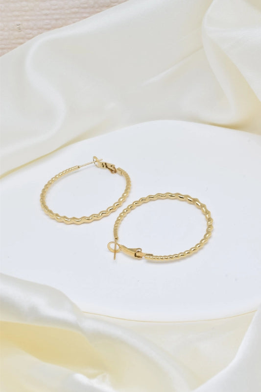 Gedraaide hoops small goudkleurig